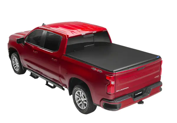 Lund 04-15 Nissan Titan (5.5ft. Bed) Hard Fold Tonneau Cover w/Bracket Kit - Black