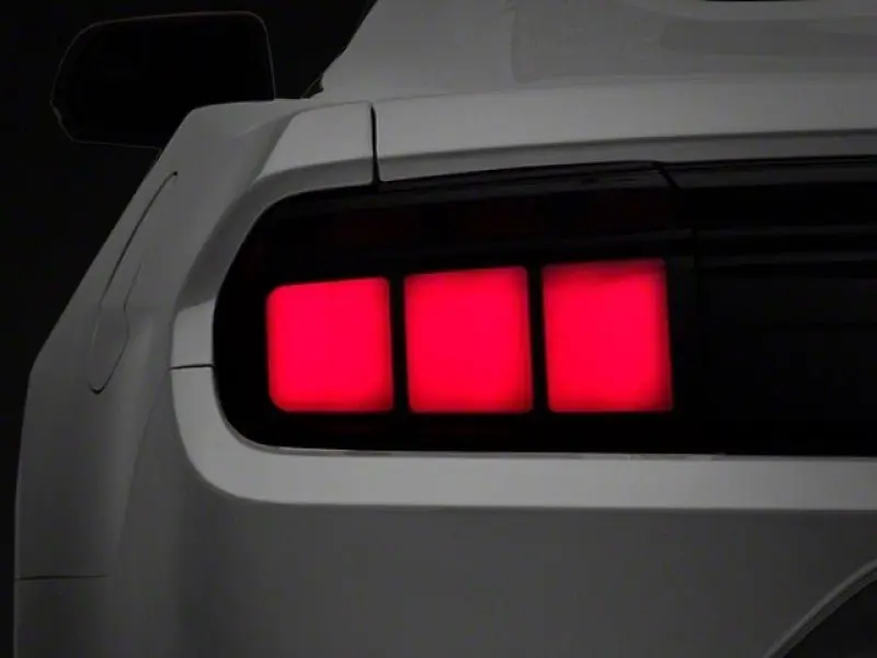 Raxiom Profile LED Tail Lights - Gloss Black Housing Smoked Lens (15-22 Ford Mustang) (RAX402183)