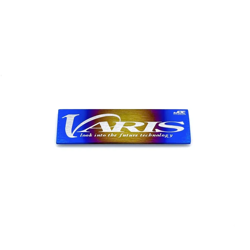 JDC Titanium "Varis" Badge | Universal